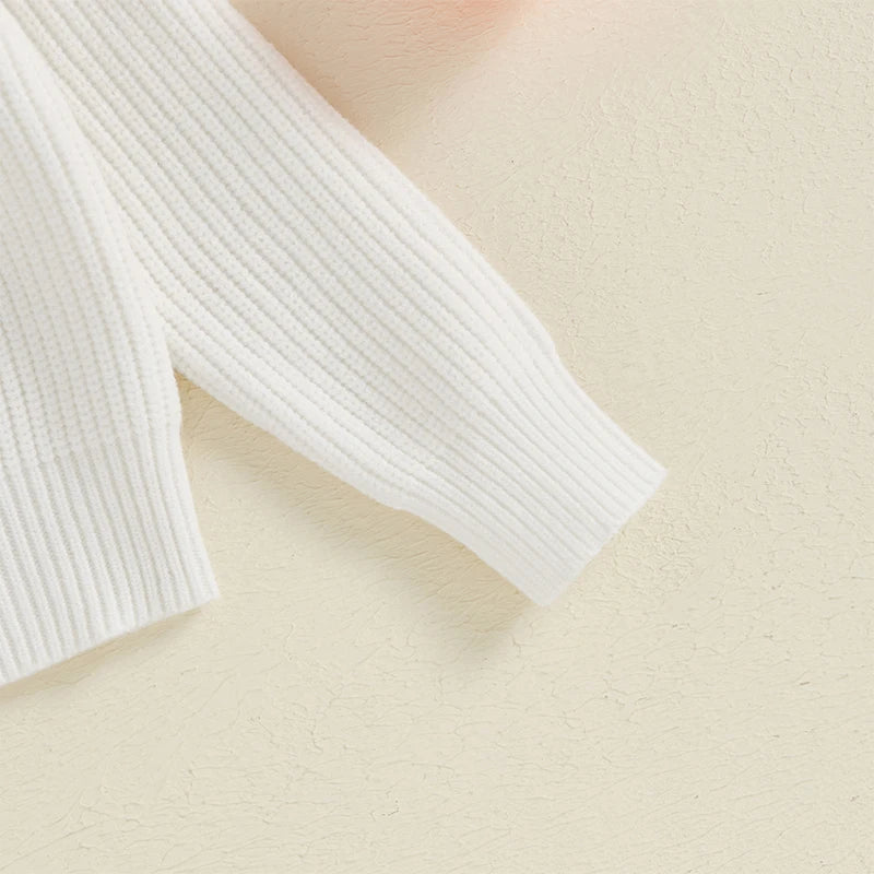 Sleeve for Halloween Ghost Knit White Sweater, boy and girl outfit, baby boutique, white knit sweater with black embroidered ghost face, Jelly Bean Baby Co.