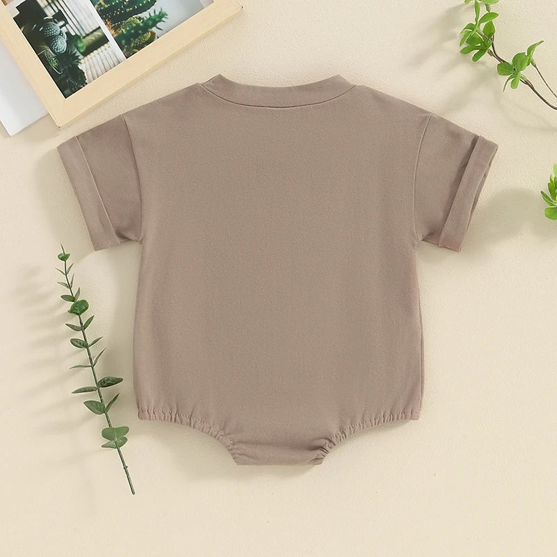 Back of Brown Cow Embroidery Short Sleeve Onesie, brown onesie for baby boy and baby girl, baby boutique, Jelly Bean Baby Co., on a decorated background