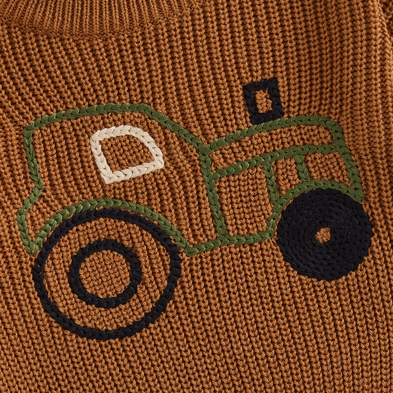 Close up of embroidered tractor for Brown knit sweater with an embroidered tractor for baby girl, baby boy, toddler girl, toddler boy, baby boutique, Jelly Bean Baby Co.