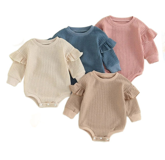 Textured long sleeved onesie with ruffled shoulders in four colors - blue, khaki, beige, and pink, baby girl onesie with three snaps at the bottom to close, baby boutique, Jelly Bean Baby Co.